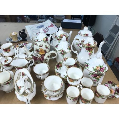 1096 - Royal Albert Old Country Rose tea set including plates, tea cups, a clock plate, forks etc