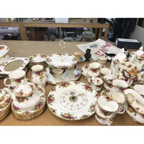1096 - Royal Albert Old Country Rose tea set including plates, tea cups, a clock plate, forks etc