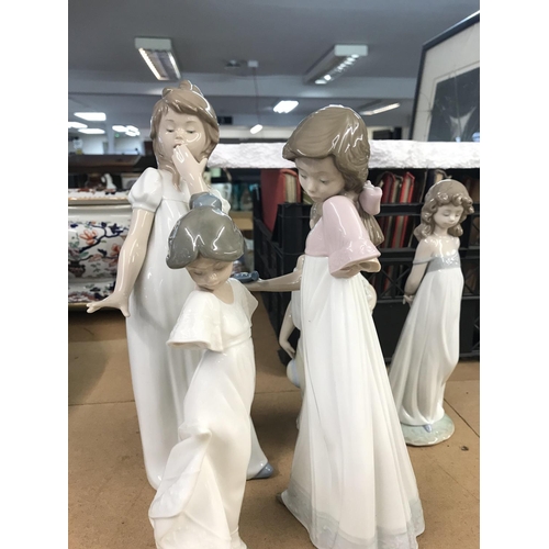 1097 - A small collection of Lladro, Nao (with needs of restoration) and a royal Doulton figure