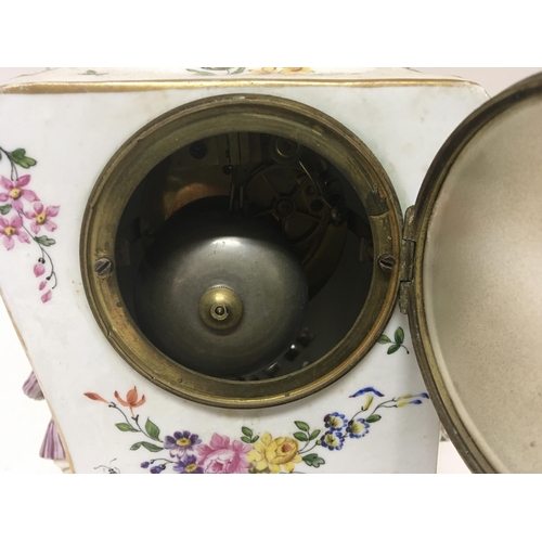 1190 - A quality late 19th century German porcelain clock the case encrusted with raised flowers with two s... 