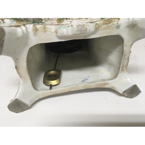 1190 - A quality late 19th century German porcelain clock the case encrusted with raised flowers with two s... 