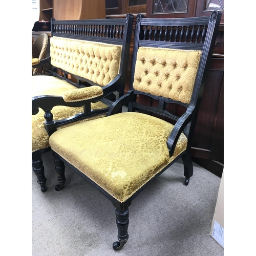 1506 - Three piece suite consisting of two arm chairs and a sofa made with ebonsied wood