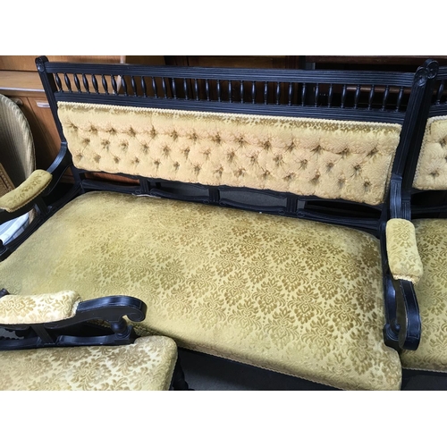 1506 - Three piece suite consisting of two arm chairs and a sofa made with ebonsied wood