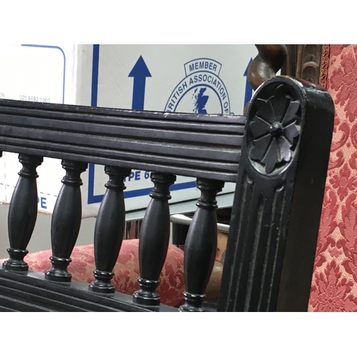 1506 - Three piece suite consisting of two arm chairs and a sofa made with ebonsied wood