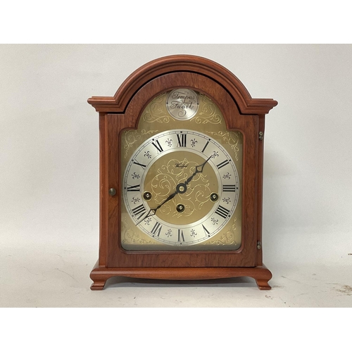 1507 - A modern clock and a barometer