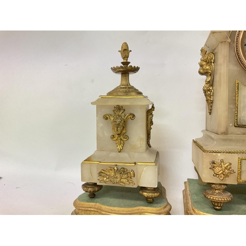1509 - A French 19th century alabaster and gilt marble clock garniture