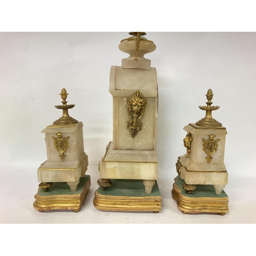 1509 - A French 19th century alabaster and gilt marble clock garniture