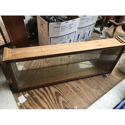 1513 - Two hanging display cabinets, largest approx 123cm x 47cm.