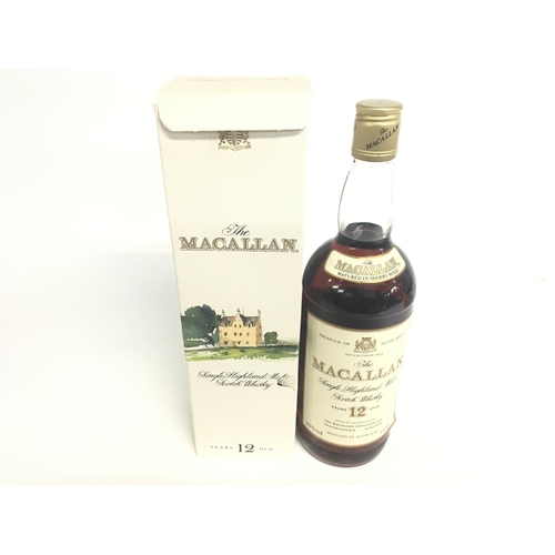 2072 - A 1980s 1 liter bottle of 12 year old MacAllan single highland malt scotch whisky in box.