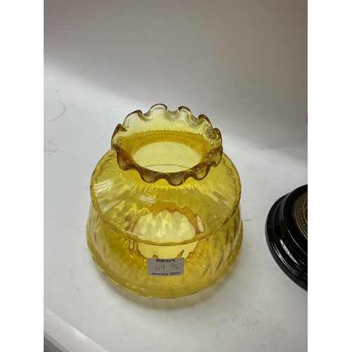 2103 - Victorian oil lamp with pink China reservoir and yellow glass shade on a brass and black base.