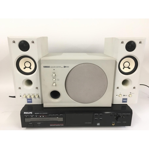 2296 - A Philips CDR600 Audio CD recorder, a Yamaha Subwoofer system, two other Yamaha speakers, video moni... 