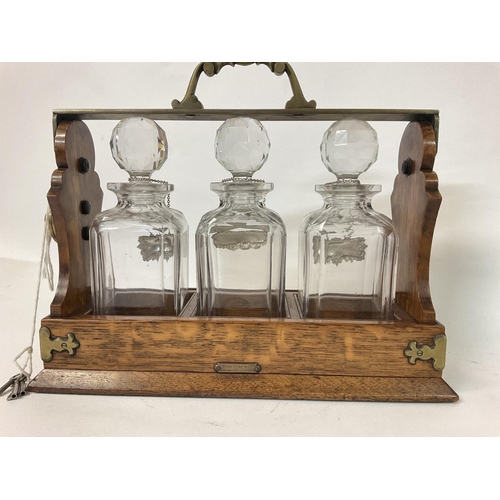 804 - Betjemannas Tantalus with decanters & hallmarked silver labels