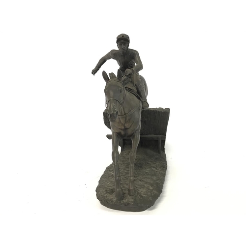 805 - Heredities Horse Racing statue titled- Over the last. 30x28cm approx