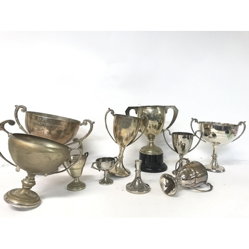 840 - A collection of assorted silver plate ornaments & a few vintage vinyl records