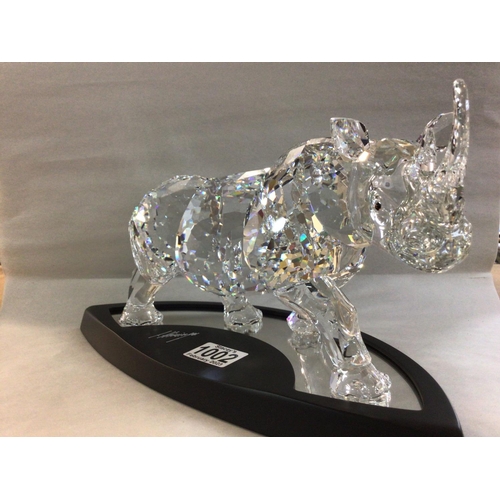 1002 - A similar lot -a very large limited edition Swarovski Rhinoceros 02166/ 10000, in fitted box with al... 