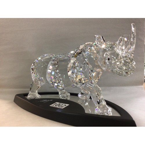 1002 - A similar lot -a very large limited edition Swarovski Rhinoceros 02166/ 10000, in fitted box with al... 