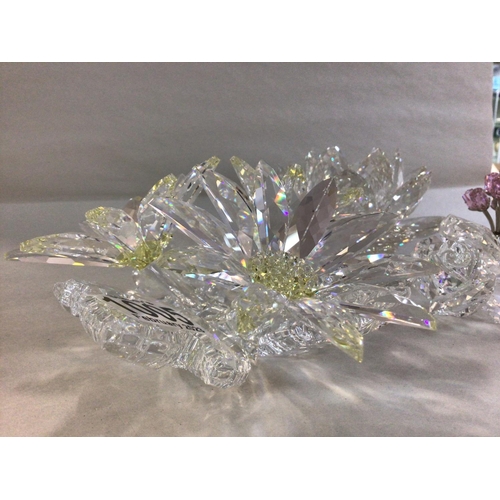 1005 - Four Swarovski flower pieces including large Maxi flower centre piece, Floating waterlily, miniature... 