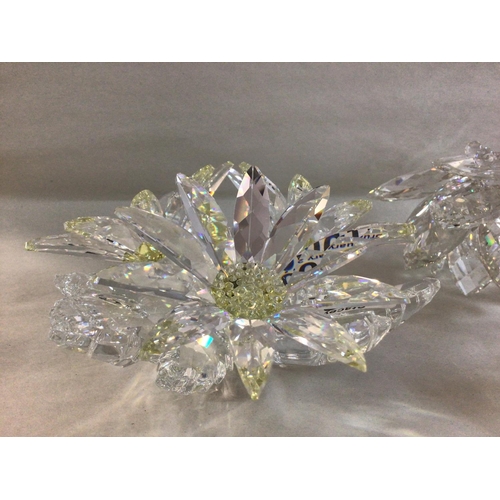 1005 - Four Swarovski flower pieces including large Maxi flower centre piece, Floating waterlily, miniature... 