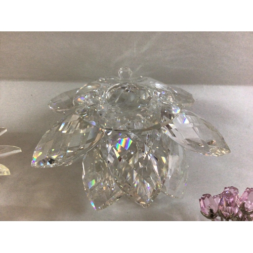 1005 - Four Swarovski flower pieces including large Maxi flower centre piece, Floating waterlily, miniature... 