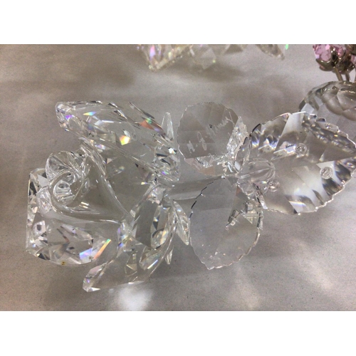 1005 - Four Swarovski flower pieces including large Maxi flower centre piece, Floating waterlily, miniature... 