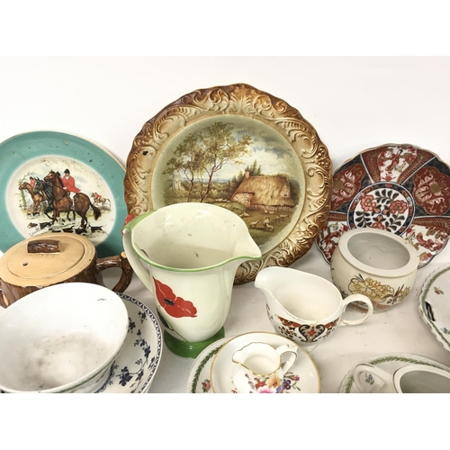 1009 - A collection of assorted tea set cups, plates, jugs, tea pots including Prelude, Salisbury, Keele et... 