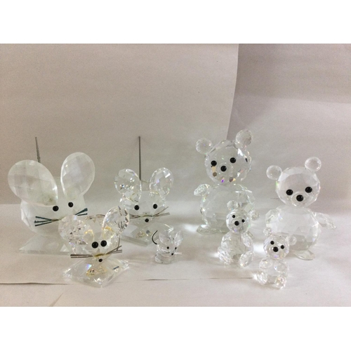 1015 - A collection of Swarovski mice and bears in varying sizes- all in fitted boxes