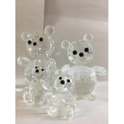 1015 - A collection of Swarovski mice and bears in varying sizes- all in fitted boxes