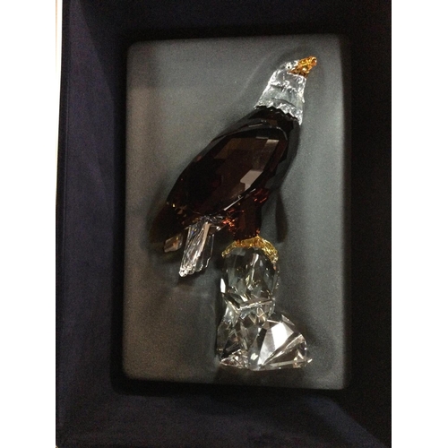 1026 - A very large Boxed Swarovski Limited Edition Bald Eagle in fitted box, fitted case, with framed cert... 