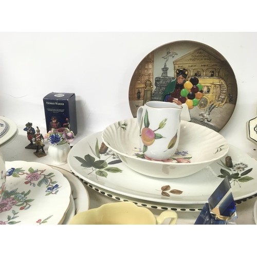 1034 - A collection of various ceramic dinnerware and tea set pieces including plates, cups, bowls etc from... 