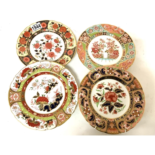 1086 - 2 sets of Crown Derby wall plates to include A set of four pates, 