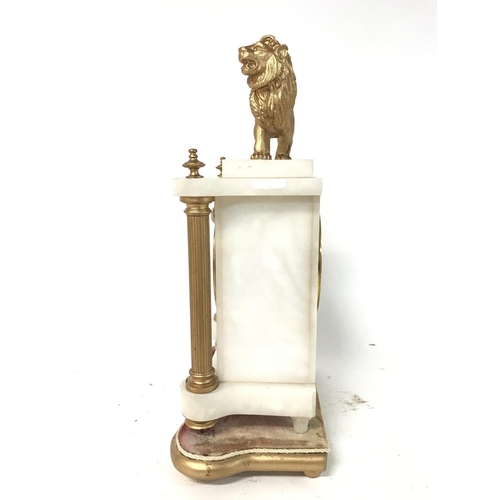 1313 - Marble Lion mantel clock, 38x24cm approx