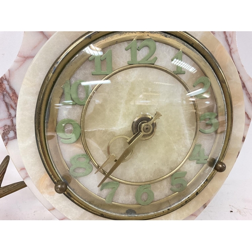 1342 - A 1930s art deco French clock on Marble base with two bronze shallows, good working order