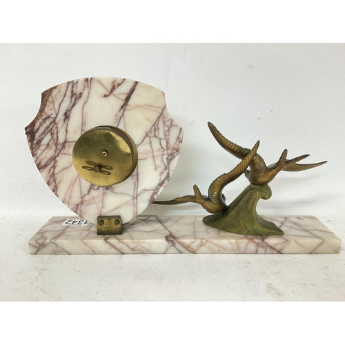 1342 - A 1930s art deco French clock on Marble base with two bronze shallows, good working order