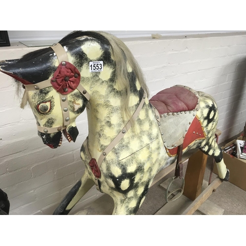 1344 - A Edwardian dapple grey rocking horse on pine stand 120 cm by 112cm approx.