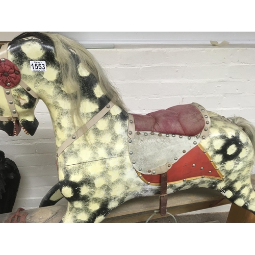 1344 - A Edwardian dapple grey rocking horse on pine stand 120 cm by 112cm approx.