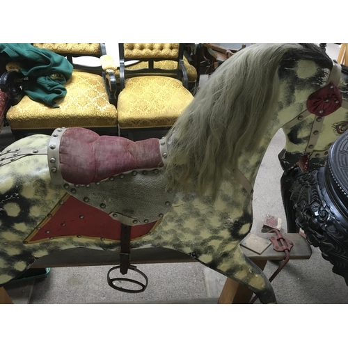 1344 - A Edwardian dapple grey rocking horse on pine stand 120 cm by 112cm approx.