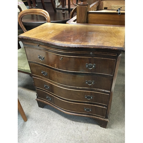 1347 - A Mahogany chest of drawers with a serpentine front and brushing slide and an Edwardian inlaid mahog... 