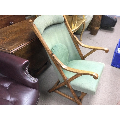 1400 - A Victorian oak campaign type chair.