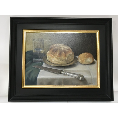 1470 - A framed 20th century still life oil painting. Our Daily Bread signed by the artist Edna Bizon.57x47... 