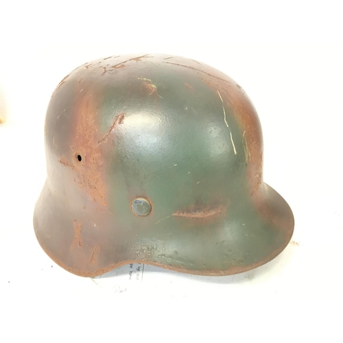 1548 - WW2 German M40 Stahlhelm Steel Combat Helmet. Green and Tan Normandy Camo with ventilation holes, si... 