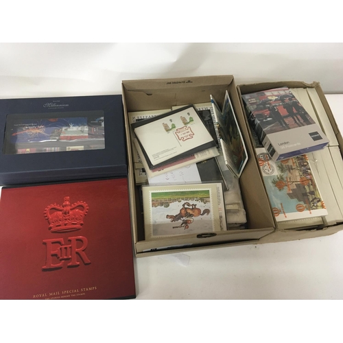 1701 - A Royal Mail Special stamp book The Millennium collection and two boxes of unopened and loose postca... 