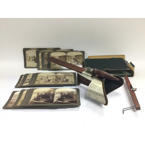 1713 - A stereoscope viewer and cards depicting the British army in various locations around the Victorian ... 