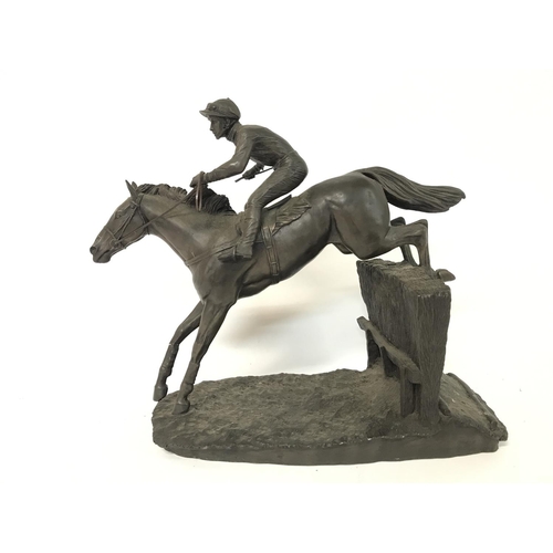 705 - Heredities Horse Racing statue titled- Over the last. 30x28cm approx