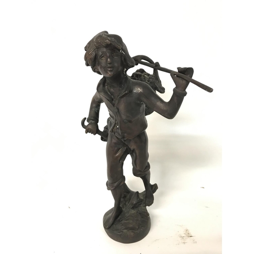 706 - Bronze cast sculpture of a young grape picker, 12x36cm approx