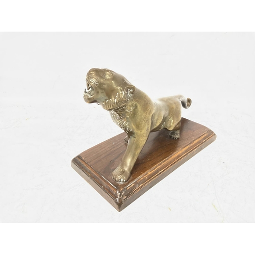 736 - Brass tiger ornament made in Almazan, Spain. Base size approximately 12x23cm