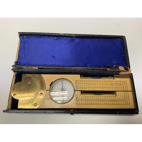 746 - A vintage Pocket surveyors level with built in sights, compass, charts. 12 inches.