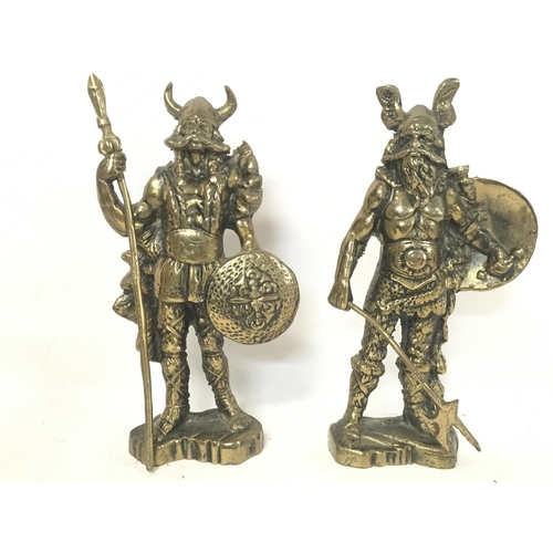 750 - A pair of brass Viking ornaments (23cm tall approx), a pair of Indian brass bells and Continental po... 