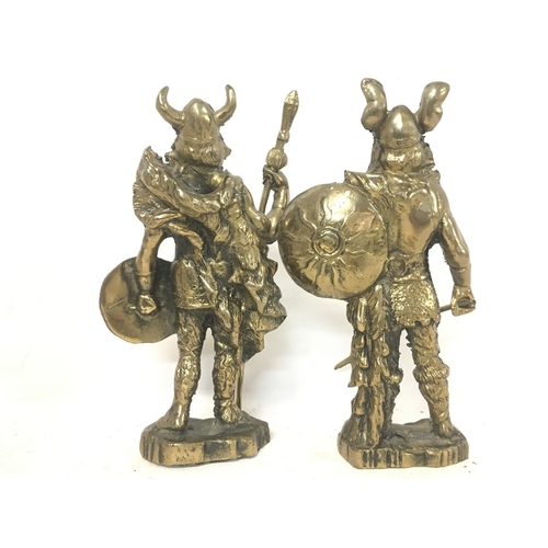 750 - A pair of brass Viking ornaments (23cm tall approx), a pair of Indian brass bells and Continental po... 