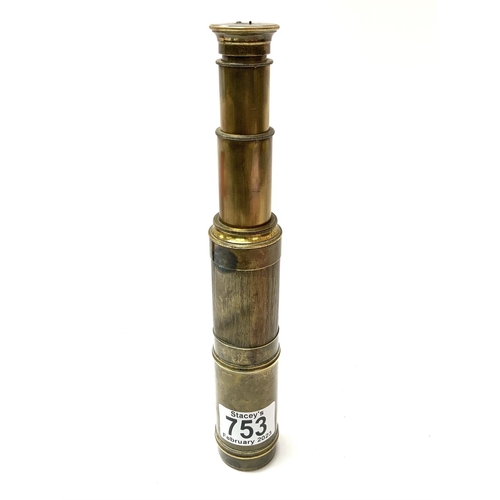 753 - An antique 3 draw brass telescope, some impact the marks. Closed 17cm / 44cm