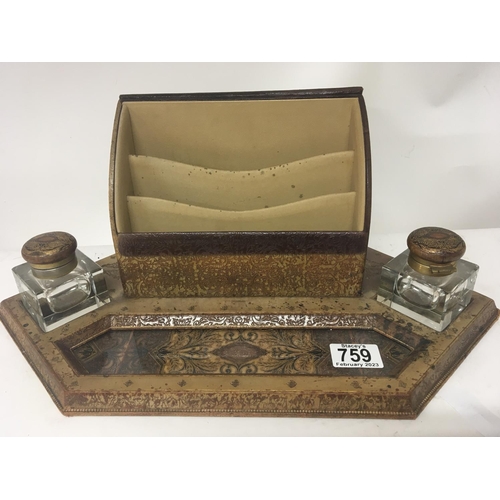 759 - A Quality tooled leather pen tray stationery box with glass ink wells.